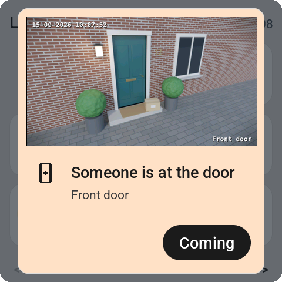 An alert on the Guition with the front door camera's picture across the top: someone is at the door, with a Coming button